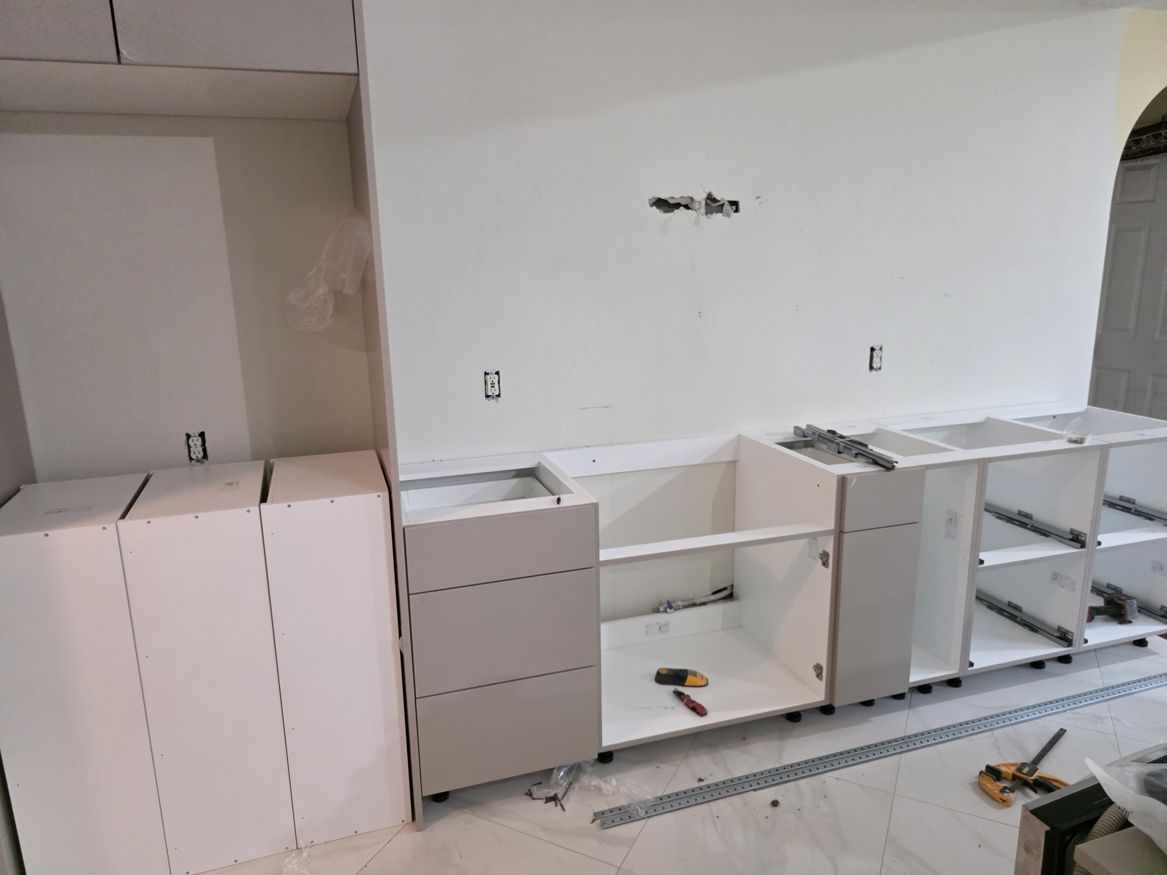 Devang base kitchen cabinets installation in progress