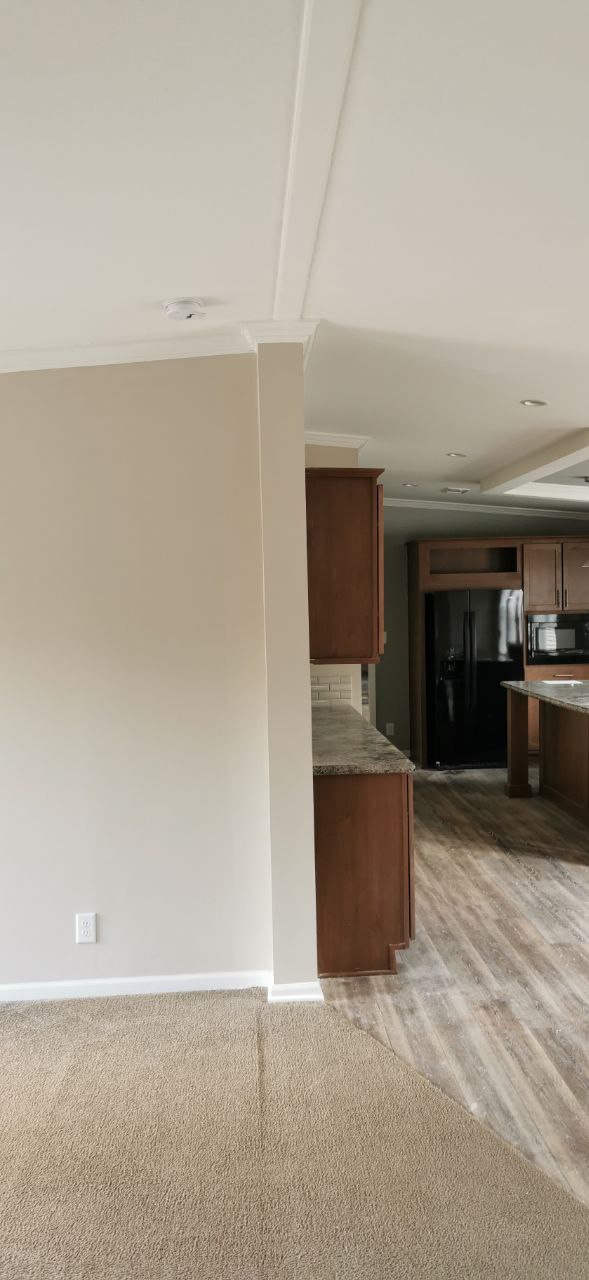 Post-delivery interior restoration for a double-wide manufactured home