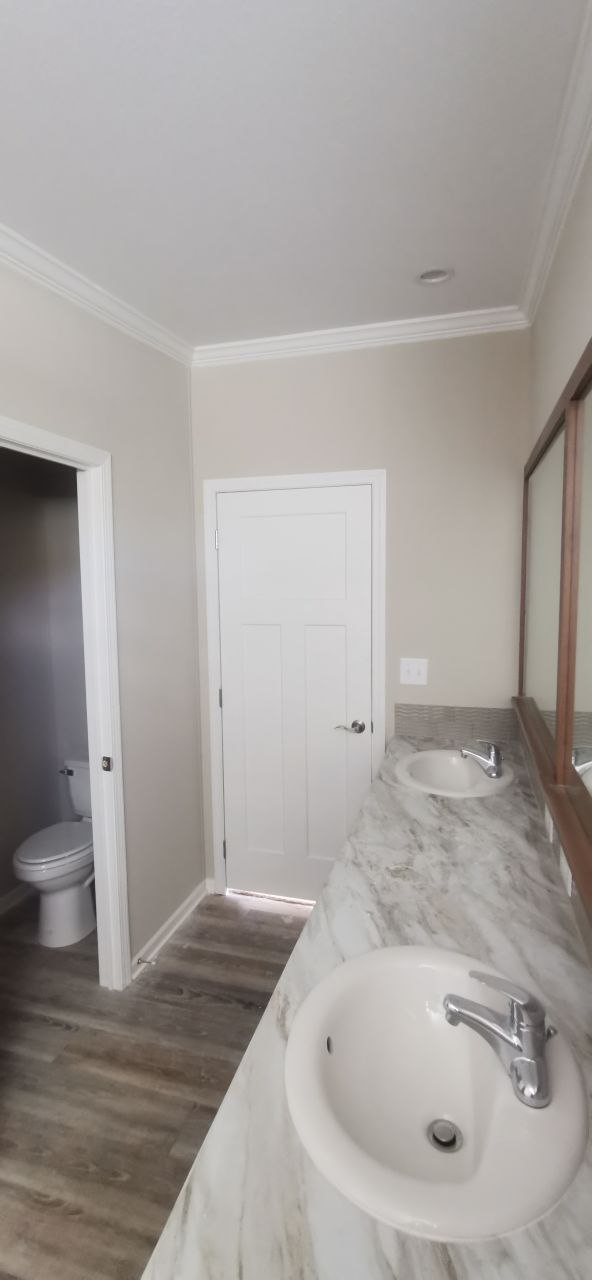 Post-delivery interior restoration for a double-wide manufactured home