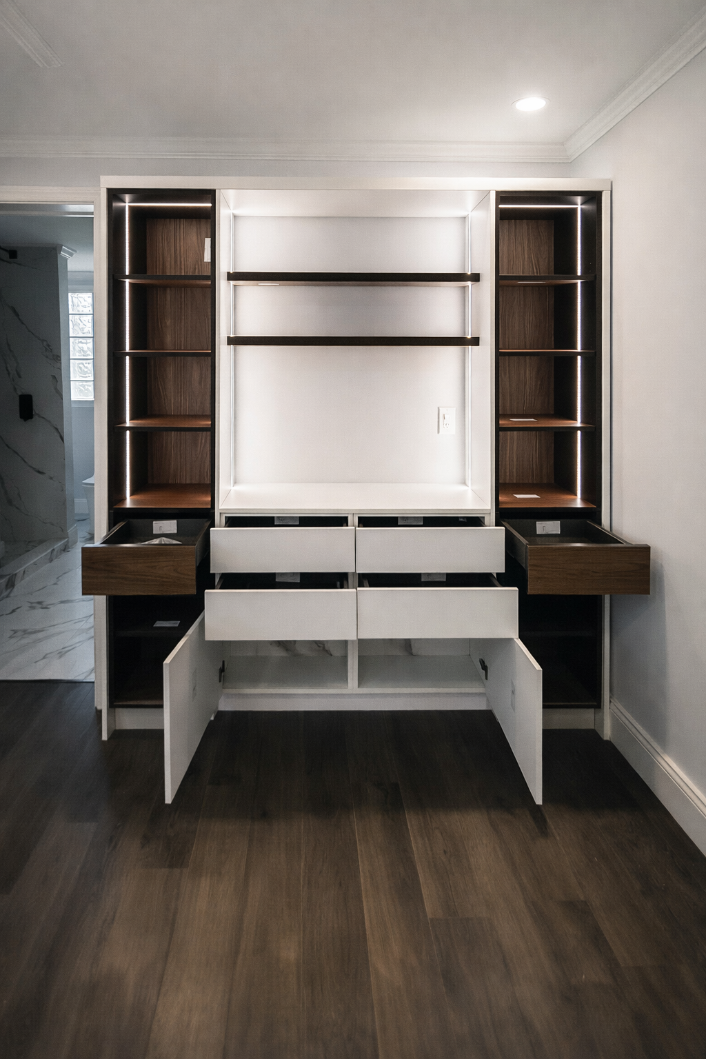 Custom cabinet storage system with drawers and shelving